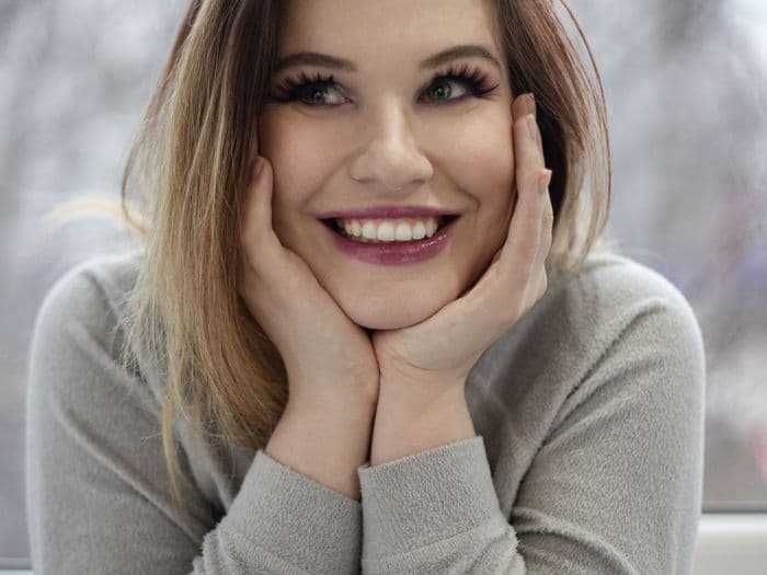 Woman radiating confidence with her beautifully restored smile